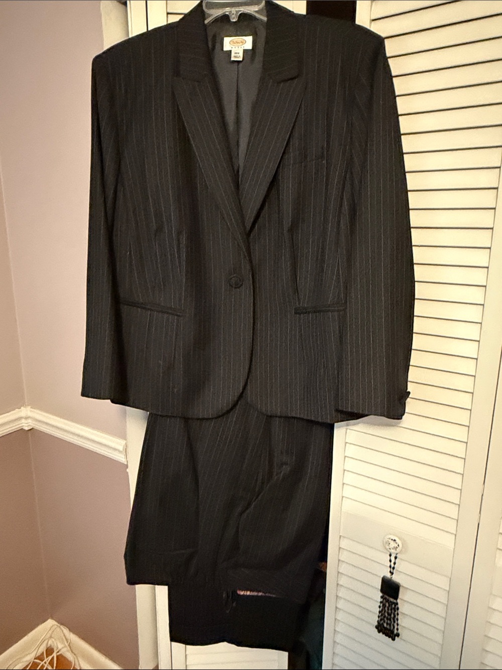Women's Black Pinstripe Suit Jacket and trousers.